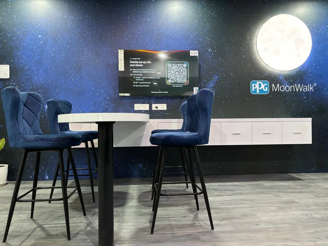 Completed consultation area with custom table and wall-mounted storage