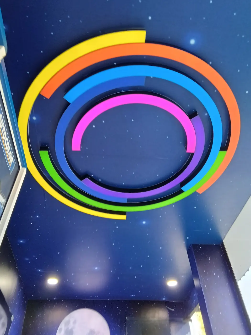 Multi-colour ceiling feature inside the PPG LINQ Srinagar studio
